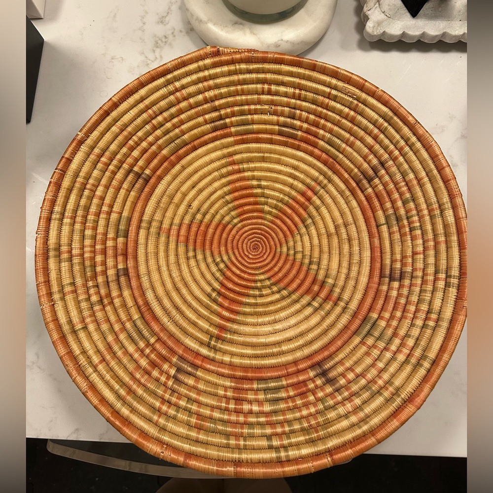 Handwoven Round Decorative Basket in Natural and salmon tones